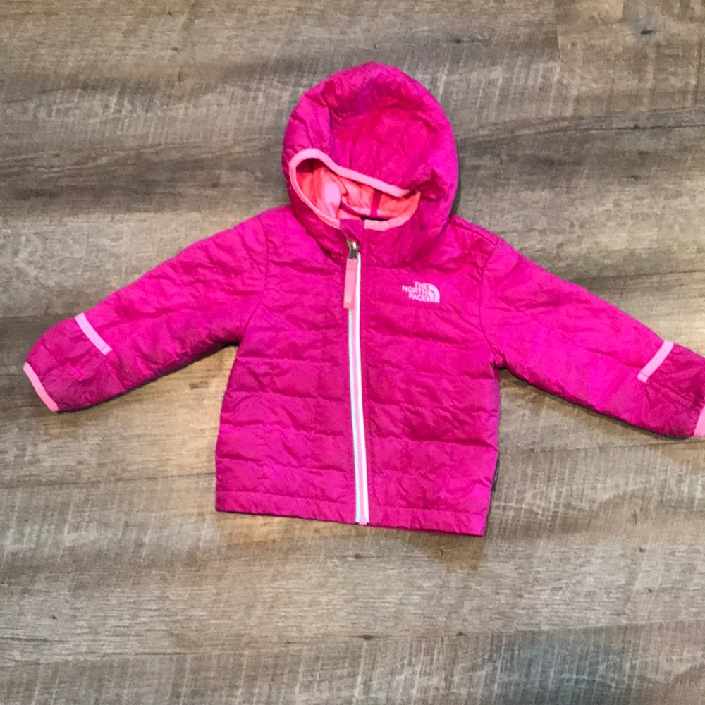 Pink North face thermoball with handcuffs